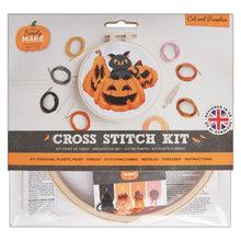 Load image into Gallery viewer, Simply Make Cross Stitch Kit in 'Cat and Pumpkin' pattern, featuring a plastic hoop with a finished black cat on orange pumpkins cross-stitch design, shown in its retail packaging with included thread spools, needles, and instructions.